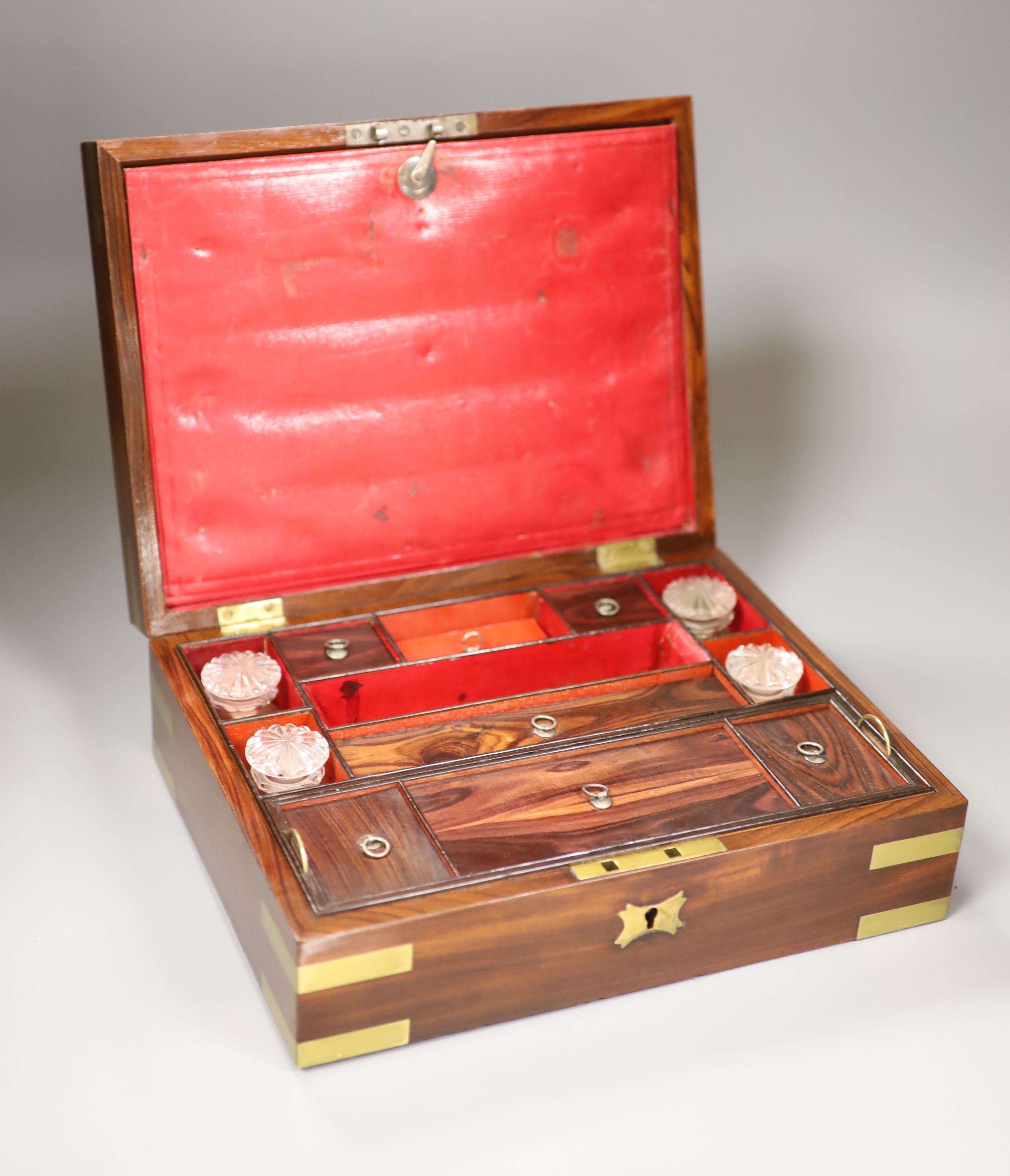 A George IV mahogany and brass vanity case, width 30cm